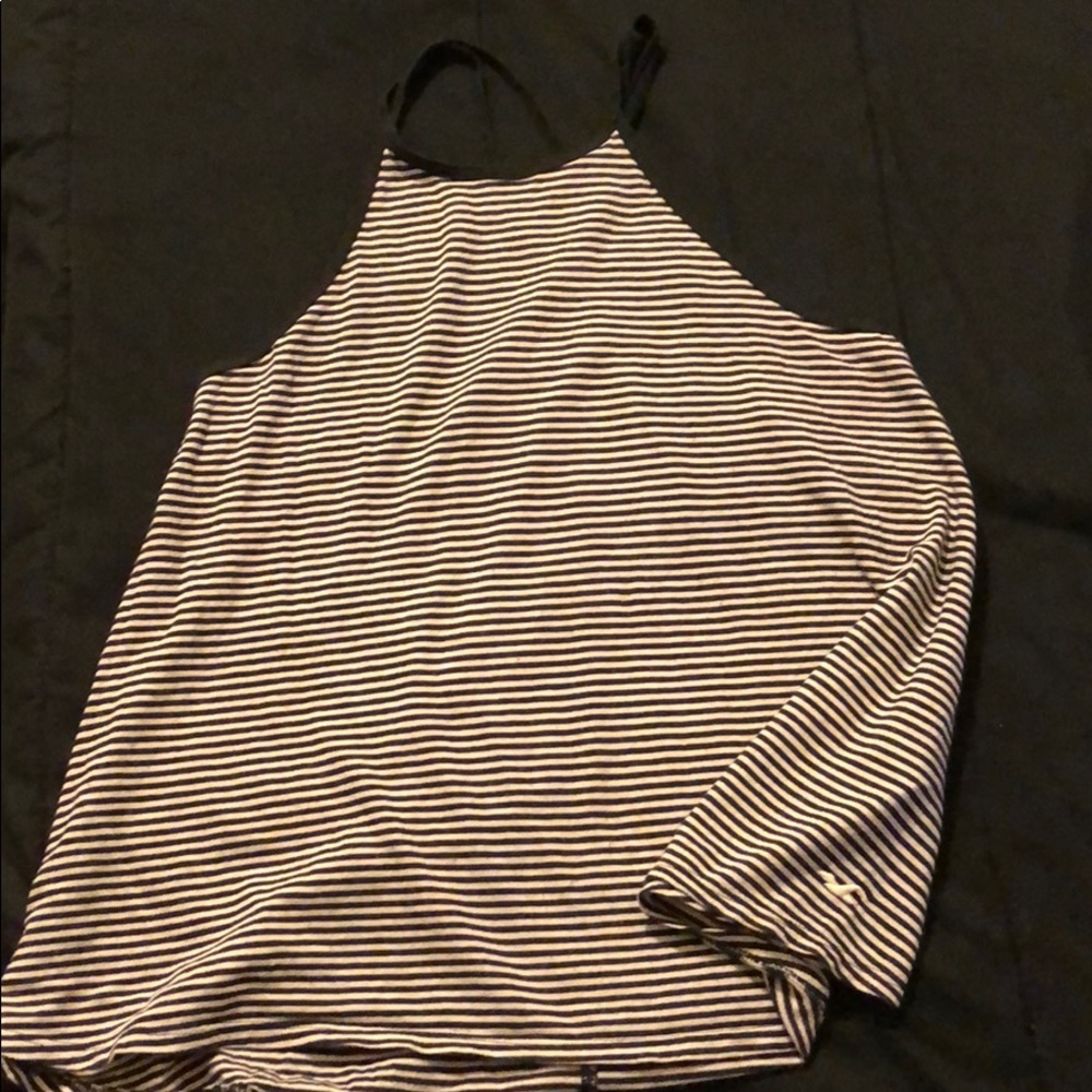 A Hollister tank top , black and white stripes.